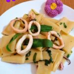 Calamarata con calamari e rucola